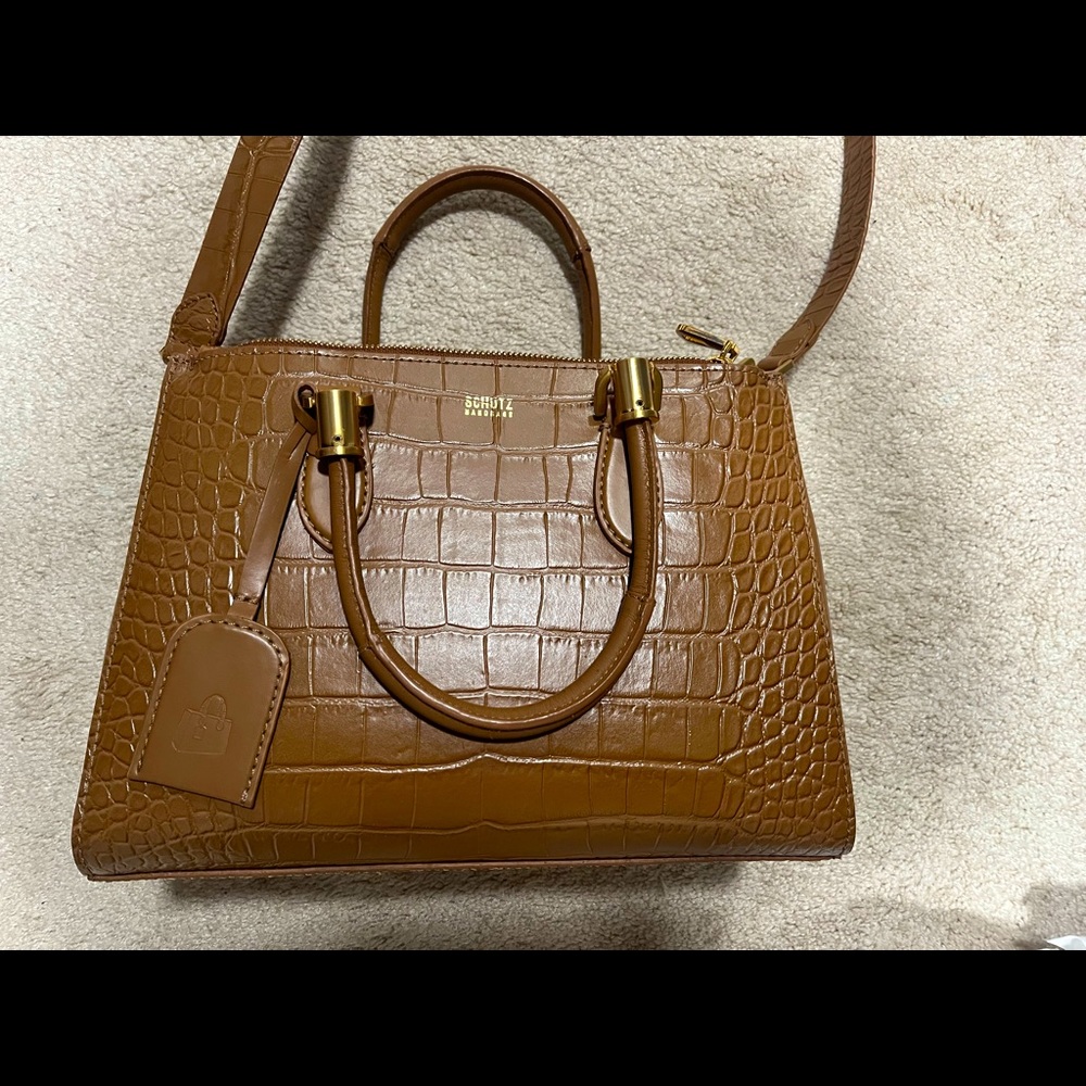 Schutz bag in caramel. Pre owned. Almost never used. Pristine shape.